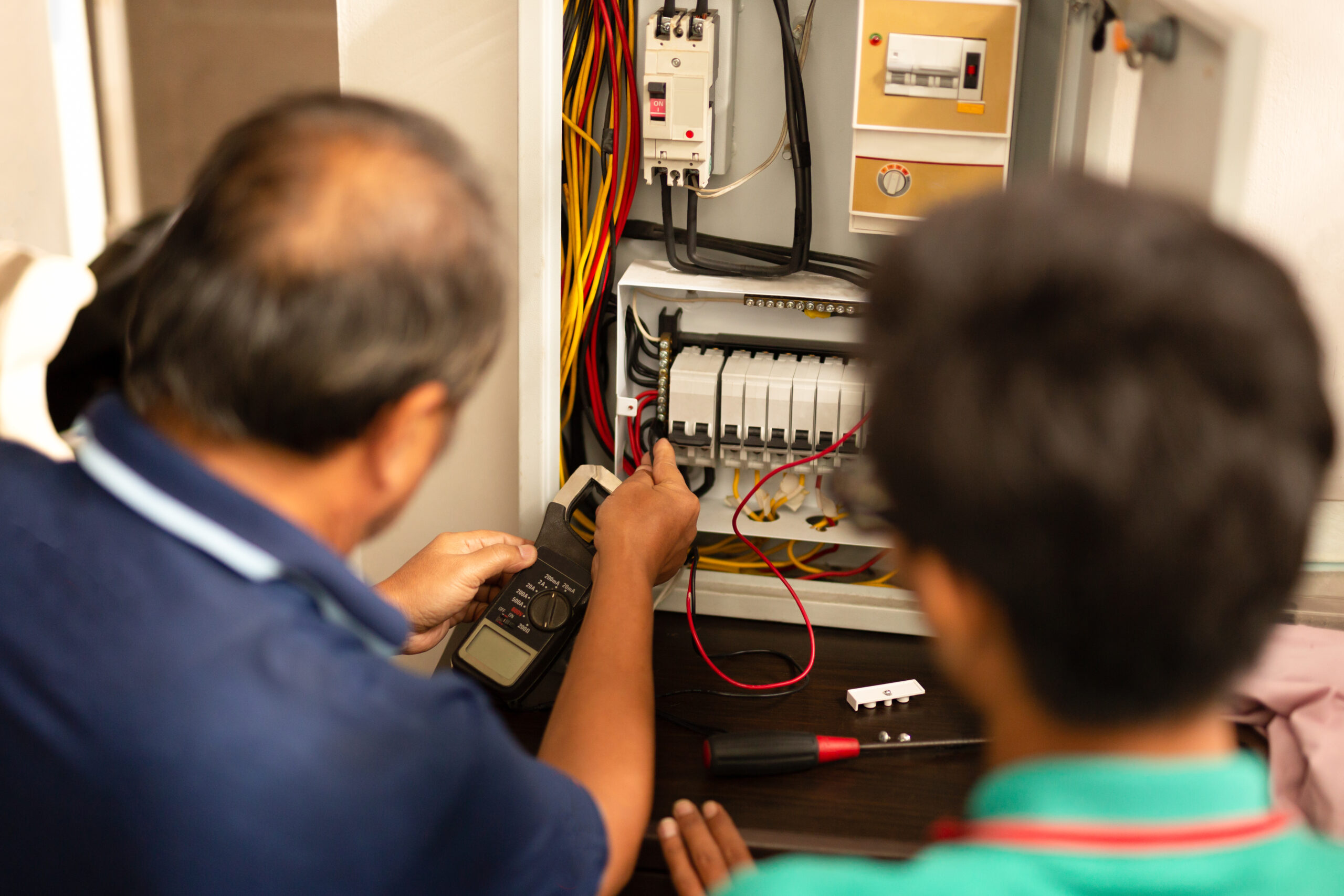 electricians repairing electrical panel wiring in 2026 03 26 06 21 55 utc