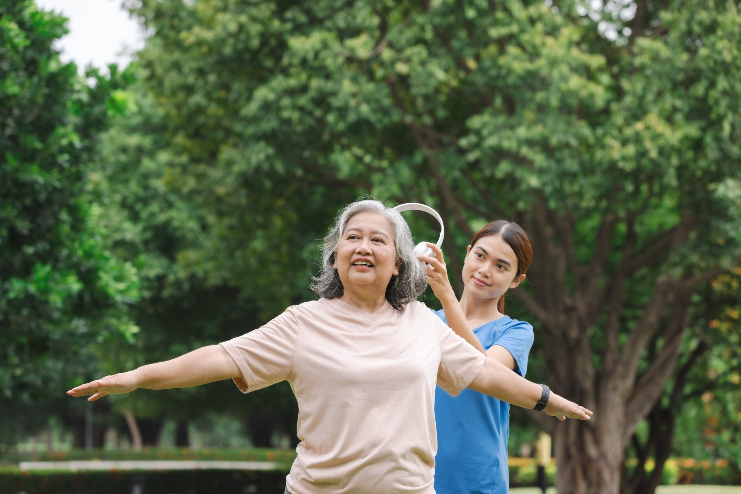 senior woman exercise with young adult in park 2026 03 16 01 24 36 utc